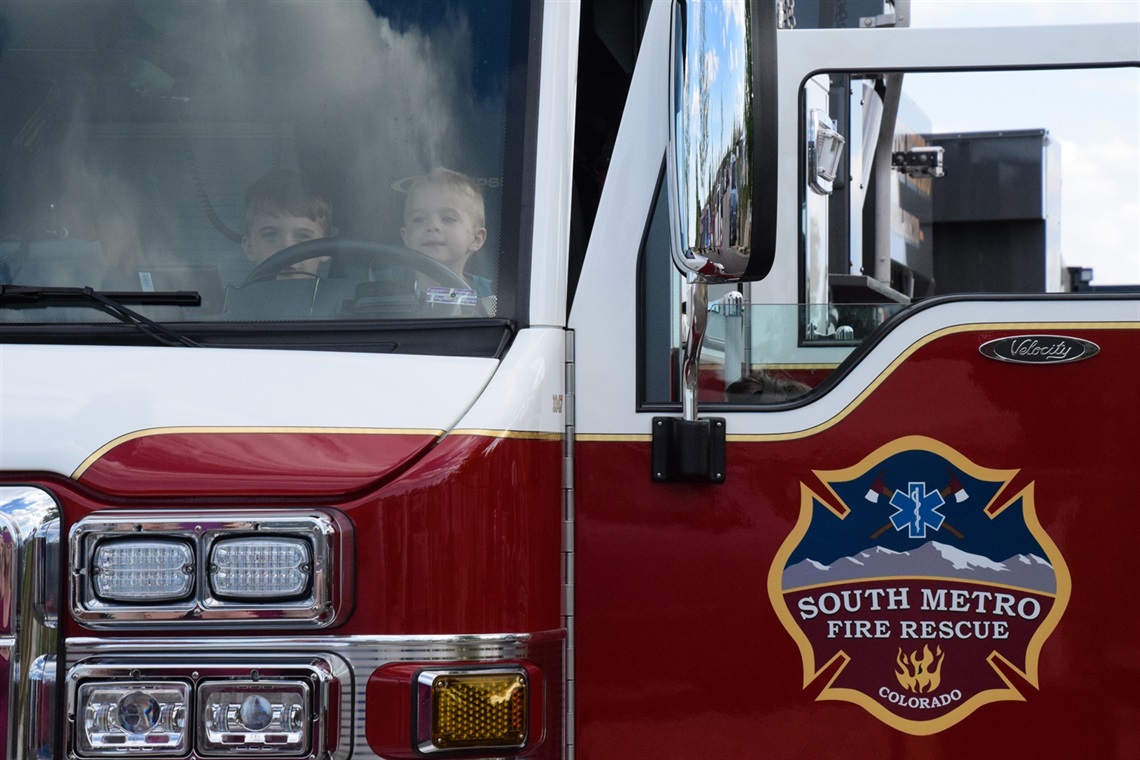 image of boys in fire truck