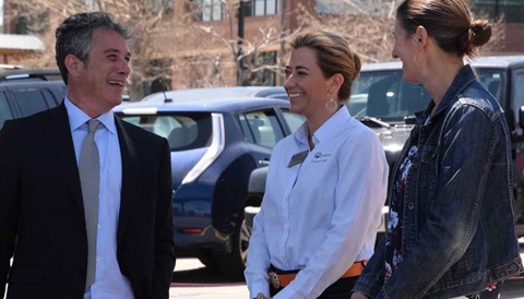 This is a photo of Stephanie Piko smiling with a group of people.