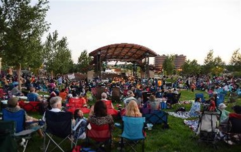 People gathered at Centennial Center Park for a concert