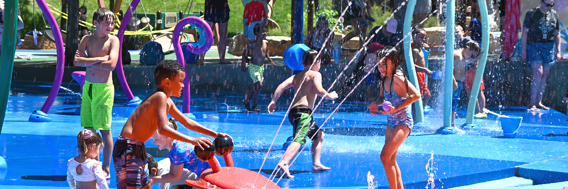 Children playing at the splash pad