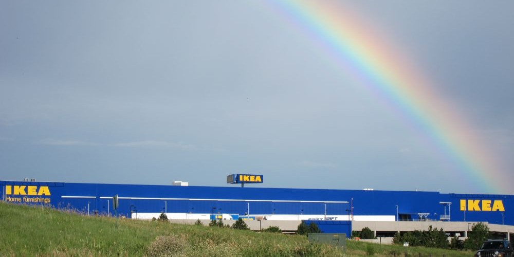 IKEA building with a rainbow above it